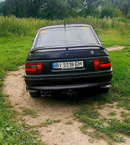 Фиолетовый Опель Вектра, объемом двигателя 2 л и пробегом 333 тыс. км за 2000 $, фото 4 на Automoto.ua