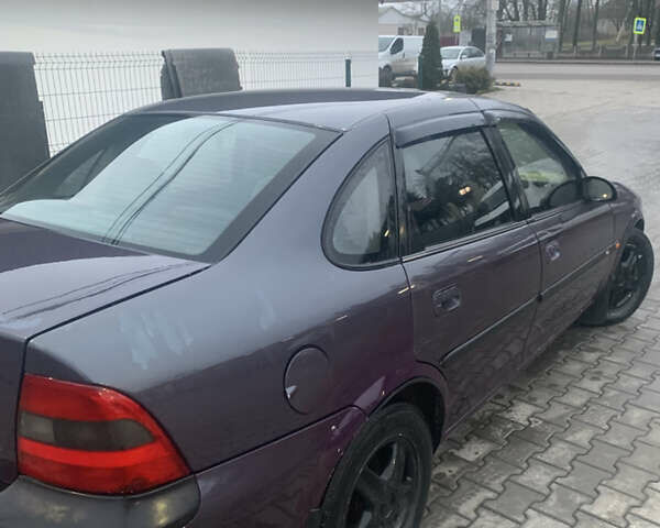 Фиолетовый Опель Вектра, объемом двигателя 1.79 л и пробегом 300 тыс. км за 1350 $, фото 10 на Automoto.ua