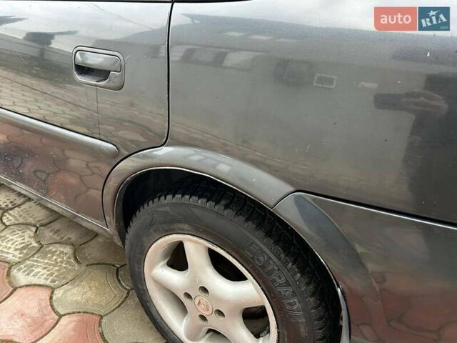 Фіолетовий Опель Вектра, об'ємом двигуна 1.7 л та пробігом 345 тис. км за 2200 $, фото 39 на Automoto.ua