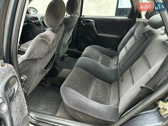 Фіолетовий Опель Вектра, об'ємом двигуна 1.7 л та пробігом 345 тис. км за 2200 $, фото 29 на Automoto.ua