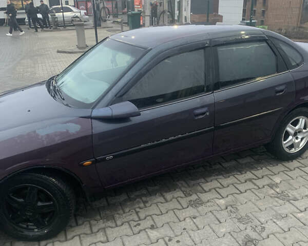 Фиолетовый Опель Вектра, объемом двигателя 1.79 л и пробегом 300 тыс. км за 1350 $, фото 6 на Automoto.ua