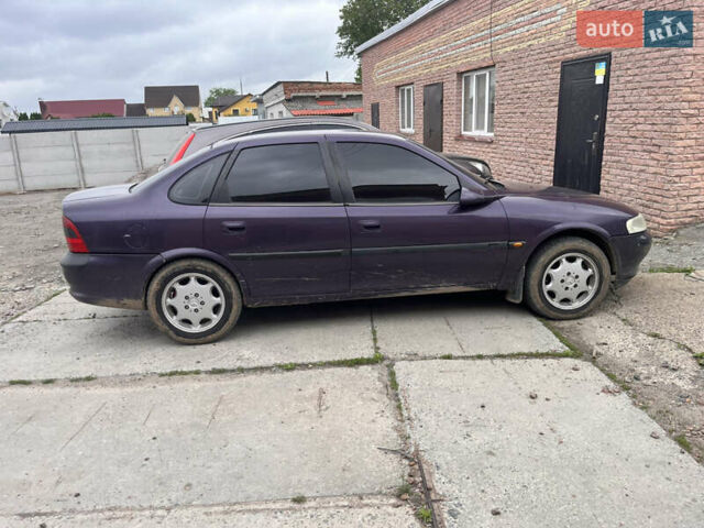 Фиолетовый Опель Вектра, объемом двигателя 2 л и пробегом 309 тыс. км за 2550 $, фото 4 на Automoto.ua