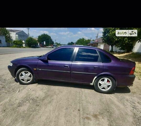 Фиолетовый Опель Вектра, объемом двигателя 2 л и пробегом 309 тыс. км за 2550 $, фото 5 на Automoto.ua