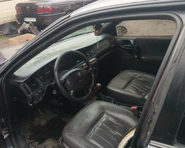 Фиолетовый Опель Вектра, объемом двигателя 1.79 л и пробегом 888 тыс. км за 1500 $, фото 6 на Automoto.ua