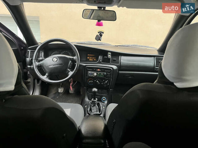 Фіолетовий Опель Вектра, об'ємом двигуна 1.8 л та пробігом 307 тис. км за 1900 $, фото 9 на Automoto.ua