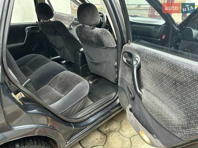 Фіолетовий Опель Вектра, об'ємом двигуна 1.7 л та пробігом 345 тис. км за 2200 $, фото 21 на Automoto.ua