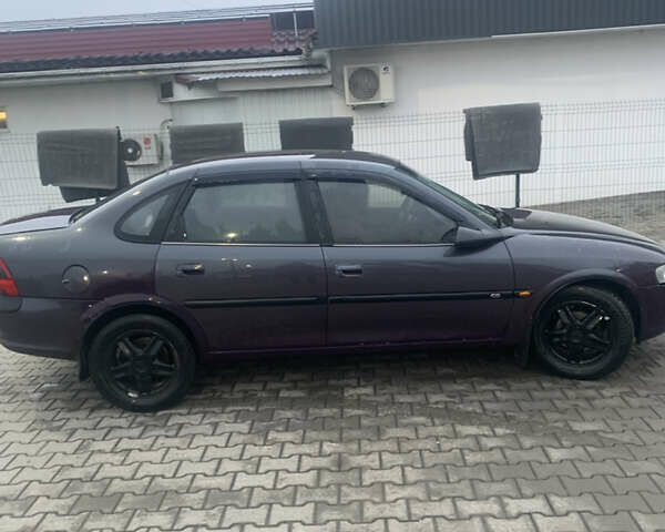 Фиолетовый Опель Вектра, объемом двигателя 1.79 л и пробегом 300 тыс. км за 1350 $, фото 11 на Automoto.ua