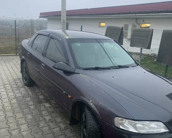 Фиолетовый Опель Вектра, объемом двигателя 1.79 л и пробегом 300 тыс. км за 1350 $, фото 12 на Automoto.ua