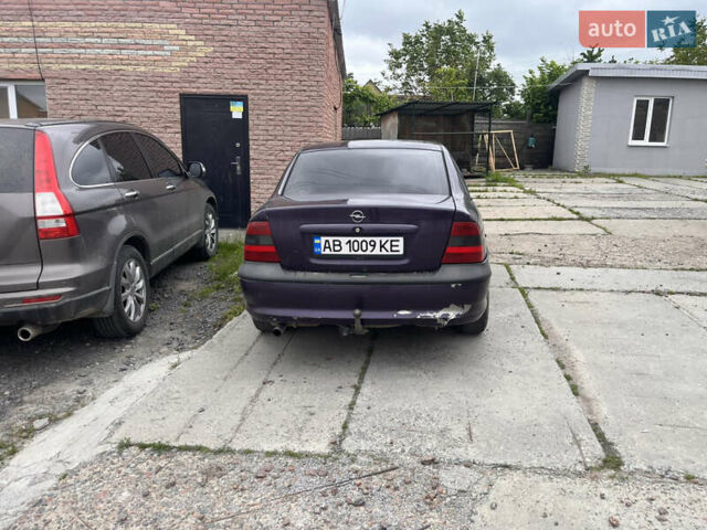 Фиолетовый Опель Вектра, объемом двигателя 2 л и пробегом 309 тыс. км за 2550 $, фото 3 на Automoto.ua