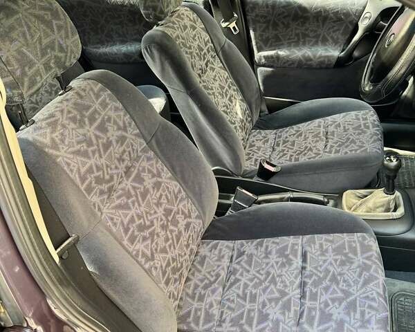Фиолетовый Опель Вектра, объемом двигателя 1.6 л и пробегом 130 тыс. км за 2390 $, фото 12 на Automoto.ua