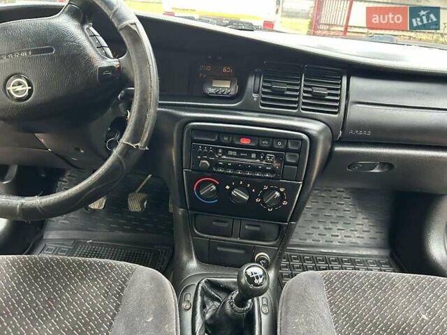 Фіолетовий Опель Вектра, об'ємом двигуна 1.7 л та пробігом 345 тис. км за 2200 $, фото 48 на Automoto.ua