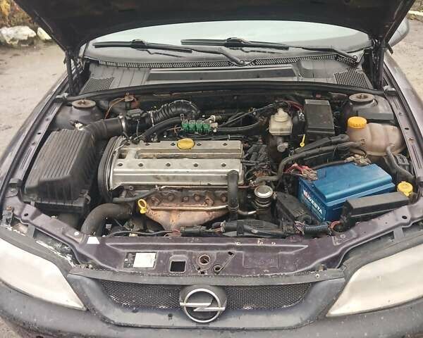 Фиолетовый Опель Вектра, объемом двигателя 1.79 л и пробегом 888 тыс. км за 1500 $, фото 8 на Automoto.ua