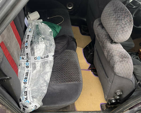 Фиолетовый Опель Вектра, объемом двигателя 2 л и пробегом 309 тыс. км за 2550 $, фото 2 на Automoto.ua