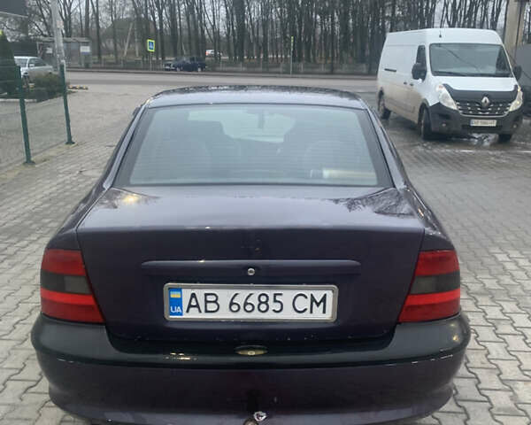 Фиолетовый Опель Вектра, объемом двигателя 1.79 л и пробегом 300 тыс. км за 1350 $, фото 9 на Automoto.ua