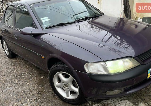 Фиолетовый Опель Вектра, объемом двигателя 1.8 л и пробегом 290 тыс. км за 2450 $, фото 9 на Automoto.ua