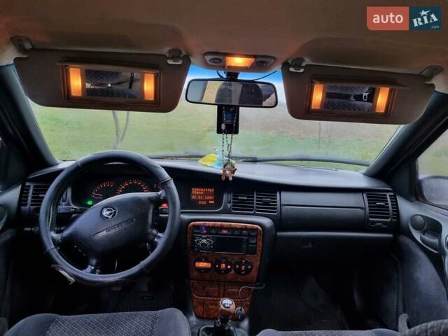 Фиолетовый Опель Вектра, объемом двигателя 1.8 л и пробегом 580 тыс. км за 1100 $, фото 8 на Automoto.ua