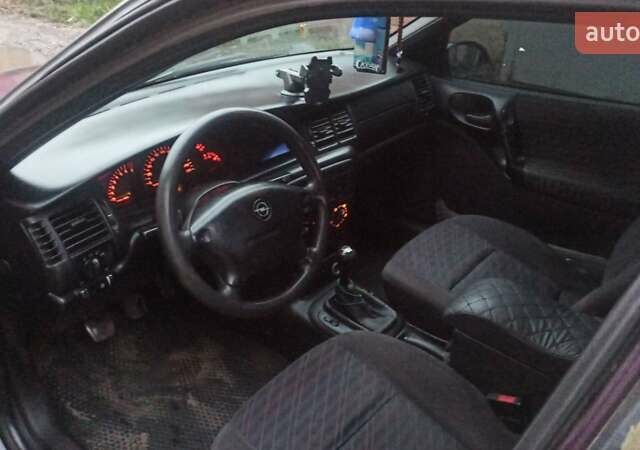 Фиолетовый Опель Вектра, объемом двигателя 1.6 л и пробегом 361 тыс. км за 2150 $, фото 27 на Automoto.ua