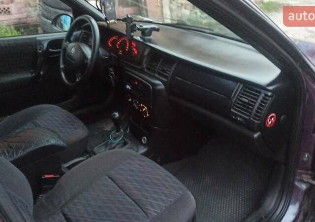 Фиолетовый Опель Вектра, объемом двигателя 1.6 л и пробегом 361 тыс. км за 2150 $, фото 21 на Automoto.ua