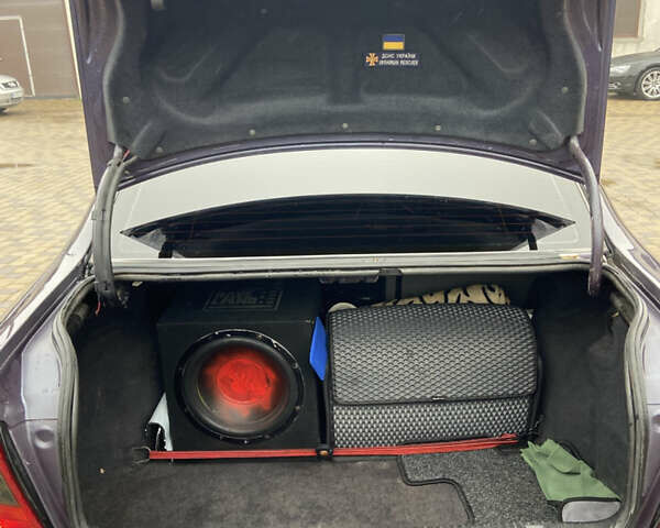 Фіолетовий Опель Вектра, об'ємом двигуна 1.8 л та пробігом 370 тис. км за 2900 $, фото 22 на Automoto.ua