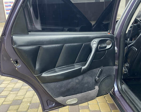 Фіолетовий Опель Вектра, об'ємом двигуна 1.8 л та пробігом 370 тис. км за 2900 $, фото 15 на Automoto.ua