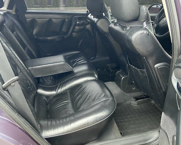 Фіолетовий Опель Вектра, об'ємом двигуна 1.8 л та пробігом 370 тис. км за 2900 $, фото 18 на Automoto.ua