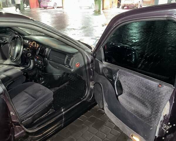 Фиолетовый Опель Вектра, объемом двигателя 2 л и пробегом 350 тыс. км за 2391 $, фото 10 на Automoto.ua