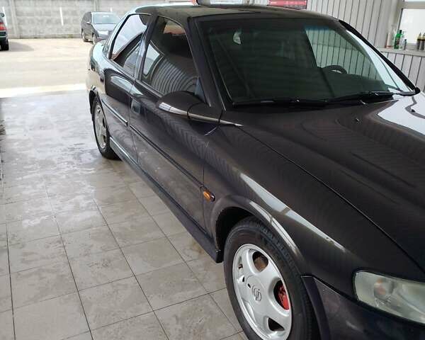 Фиолетовый Опель Вектра, объемом двигателя 2 л и пробегом 226 тыс. км за 2850 $, фото 10 на Automoto.ua