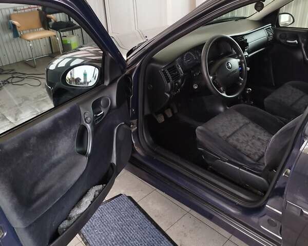 Фиолетовый Опель Вектра, объемом двигателя 2 л и пробегом 226 тыс. км за 2850 $, фото 15 на Automoto.ua