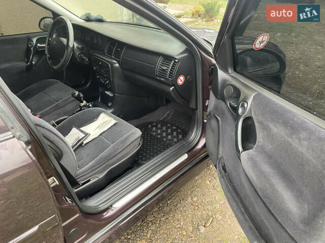 Фиолетовый Опель Вектра, объемом двигателя 1.6 л и пробегом 65 тыс. км за 2800 $, фото 21 на Automoto.ua