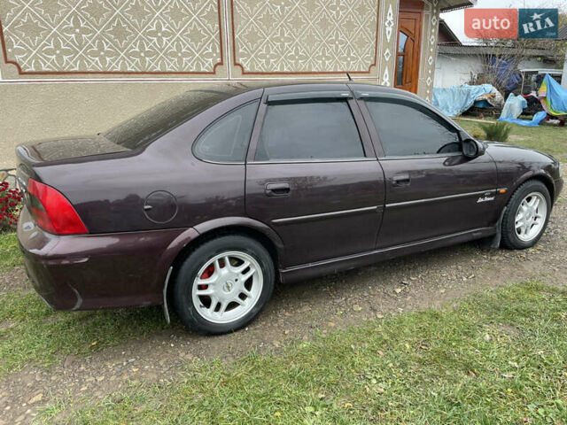 Фиолетовый Опель Вектра, объемом двигателя 1.6 л и пробегом 65 тыс. км за 2800 $, фото 2 на Automoto.ua