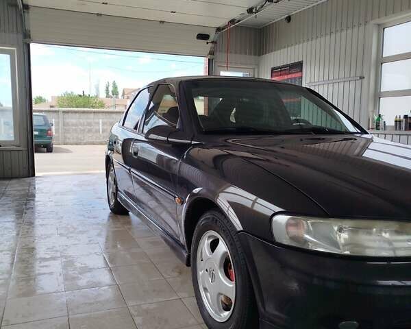 Фиолетовый Опель Вектра, объемом двигателя 2 л и пробегом 226 тыс. км за 2850 $, фото 17 на Automoto.ua