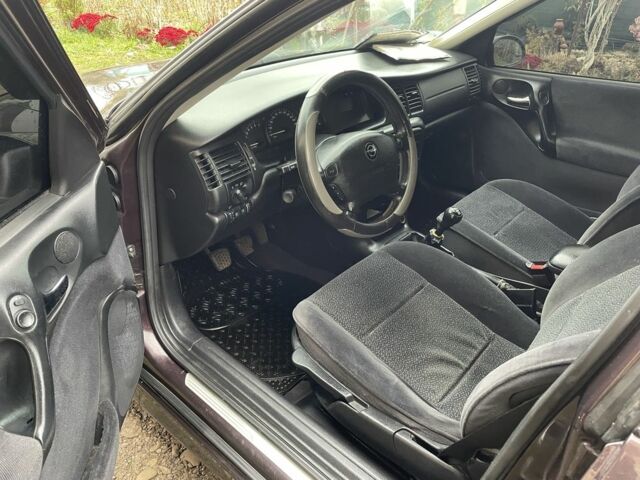 Фиолетовый Опель Вектра, объемом двигателя 1.6 л и пробегом 65 тыс. км за 2700 $, фото 12 на Automoto.ua