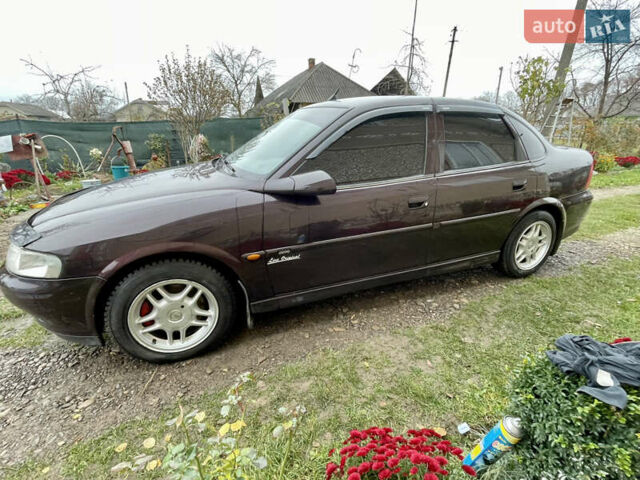 Фиолетовый Опель Вектра, объемом двигателя 1.6 л и пробегом 65 тыс. км за 2800 $, фото 13 на Automoto.ua