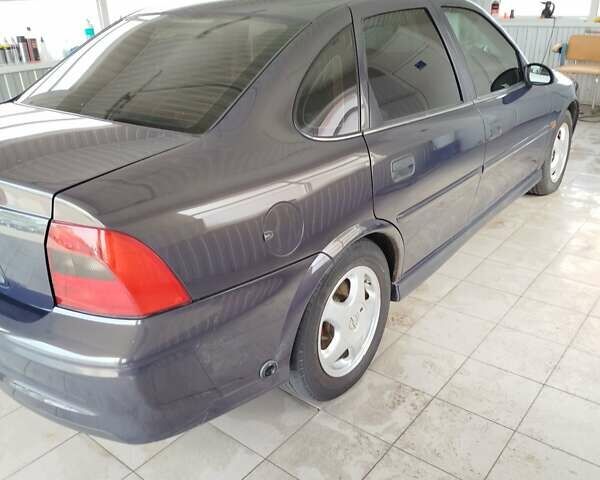 Фиолетовый Опель Вектра, объемом двигателя 2 л и пробегом 226 тыс. км за 2850 $, фото 5 на Automoto.ua