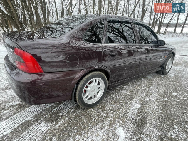 Фиолетовый Опель Вектра, объемом двигателя 1.6 л и пробегом 145 тыс. км за 3750 $, фото 9 на Automoto.ua