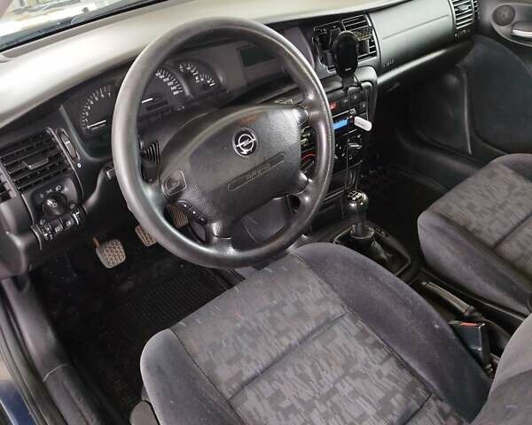 Фиолетовый Опель Вектра, объемом двигателя 2 л и пробегом 226 тыс. км за 2850 $, фото 19 на Automoto.ua