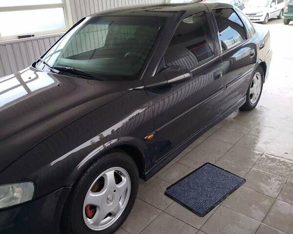 Фиолетовый Опель Вектра, объемом двигателя 2 л и пробегом 226 тыс. км за 2850 $, фото 18 на Automoto.ua