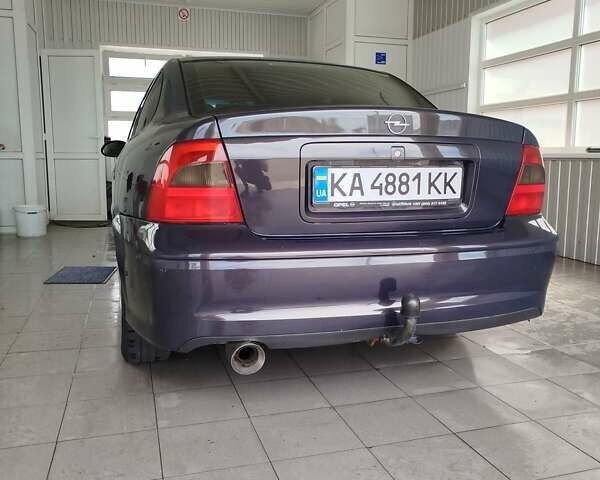 Фиолетовый Опель Вектра, объемом двигателя 2 л и пробегом 226 тыс. км за 2850 $, фото 9 на Automoto.ua