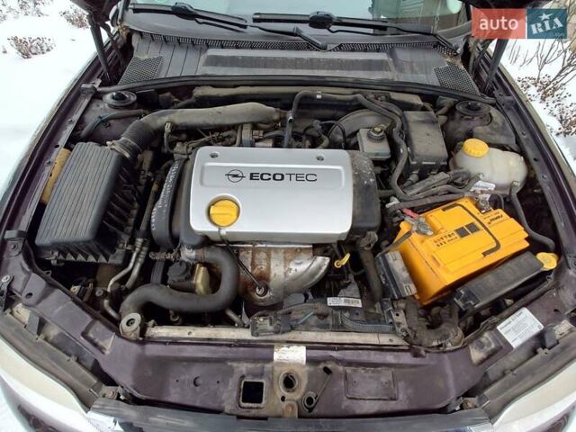 Фиолетовый Опель Вектра, объемом двигателя 1.6 л и пробегом 155 тыс. км за 3700 $, фото 20 на Automoto.ua