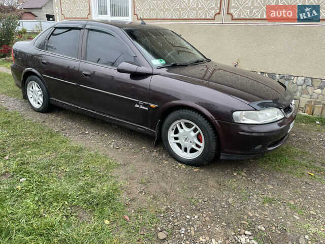 Фиолетовый Опель Вектра, объемом двигателя 1.6 л и пробегом 65 тыс. км за 2800 $, фото 10 на Automoto.ua