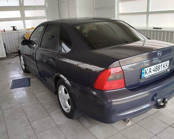 Фиолетовый Опель Вектра, объемом двигателя 2 л и пробегом 226 тыс. км за 2850 $, фото 6 на Automoto.ua