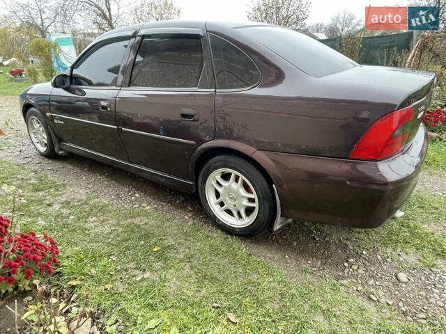 Фиолетовый Опель Вектра, объемом двигателя 1.6 л и пробегом 65 тыс. км за 2800 $, фото 15 на Automoto.ua