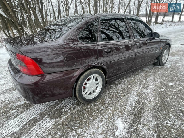 Фиолетовый Опель Вектра, объемом двигателя 1.6 л и пробегом 145 тыс. км за 3750 $, фото 13 на Automoto.ua