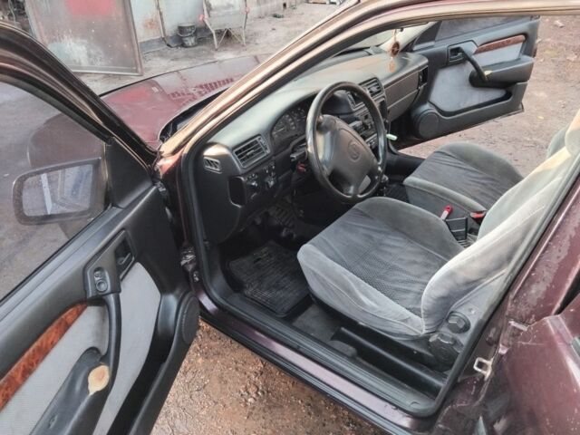 Фиолетовый Опель Вектра, объемом двигателя 2 л и пробегом 44 тыс. км за 1600 $, фото 4 на Automoto.ua