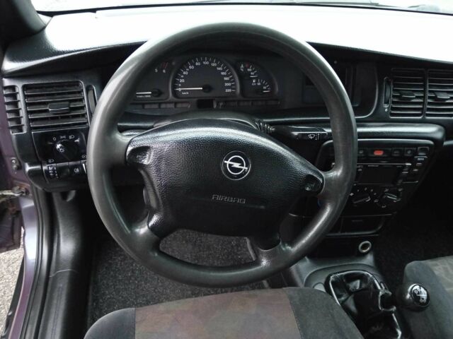 Фиолетовый Опель Вектра, объемом двигателя 2 л и пробегом 453 тыс. км за 2900 $, фото 19 на Automoto.ua