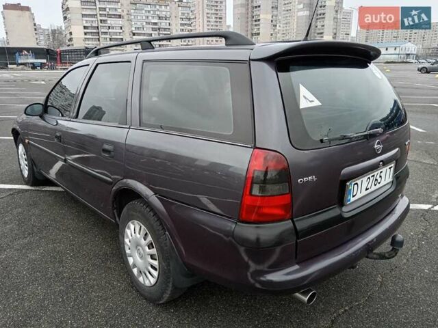 Фиолетовый Опель Вектра, объемом двигателя 2 л и пробегом 453 тыс. км за 2400 $, фото 8 на Automoto.ua