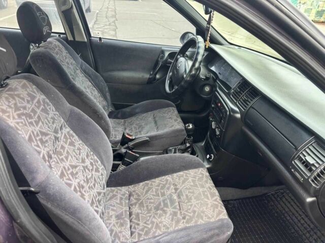 Фиолетовый Опель Вектра, объемом двигателя 1.6 л и пробегом 460 тыс. км за 2500 $, фото 7 на Automoto.ua