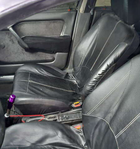 Фіолетовий Опель Вектра, об'ємом двигуна 2 л та пробігом 293 тис. км за 1450 $, фото 7 на Automoto.ua