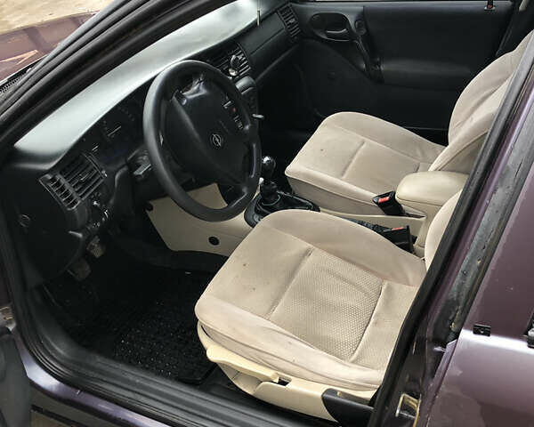 Фиолетовый Опель Вектра, объемом двигателя 1.6 л и пробегом 390 тыс. км за 1900 $, фото 4 на Automoto.ua