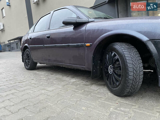 Фіолетовий Опель Вектра, об'ємом двигуна 1.6 л та пробігом 300 тис. км за 1400 $, фото 14 на Automoto.ua